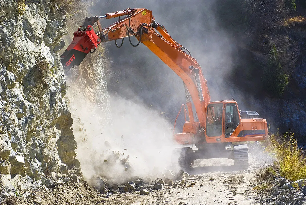 HKM Grey G230, HKM hydraulic breaker at work in the field